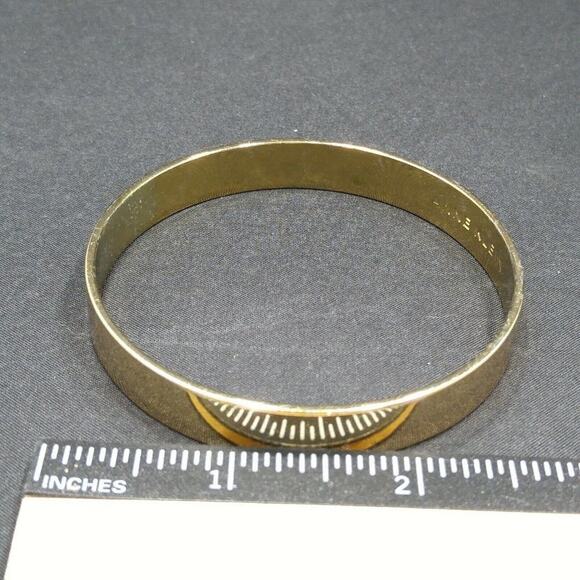 Anne Klein Solid Gold Tone Bangle Bracelet, 7 3/4 Inches, Very Reflective - Picture 6 of 8
